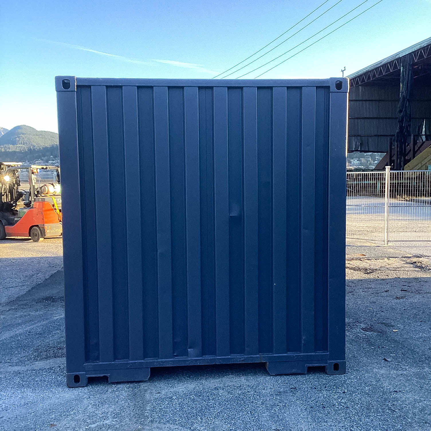 26′ Cut-Down Shipping Container w/Roll-Up Door - Custom Cubes