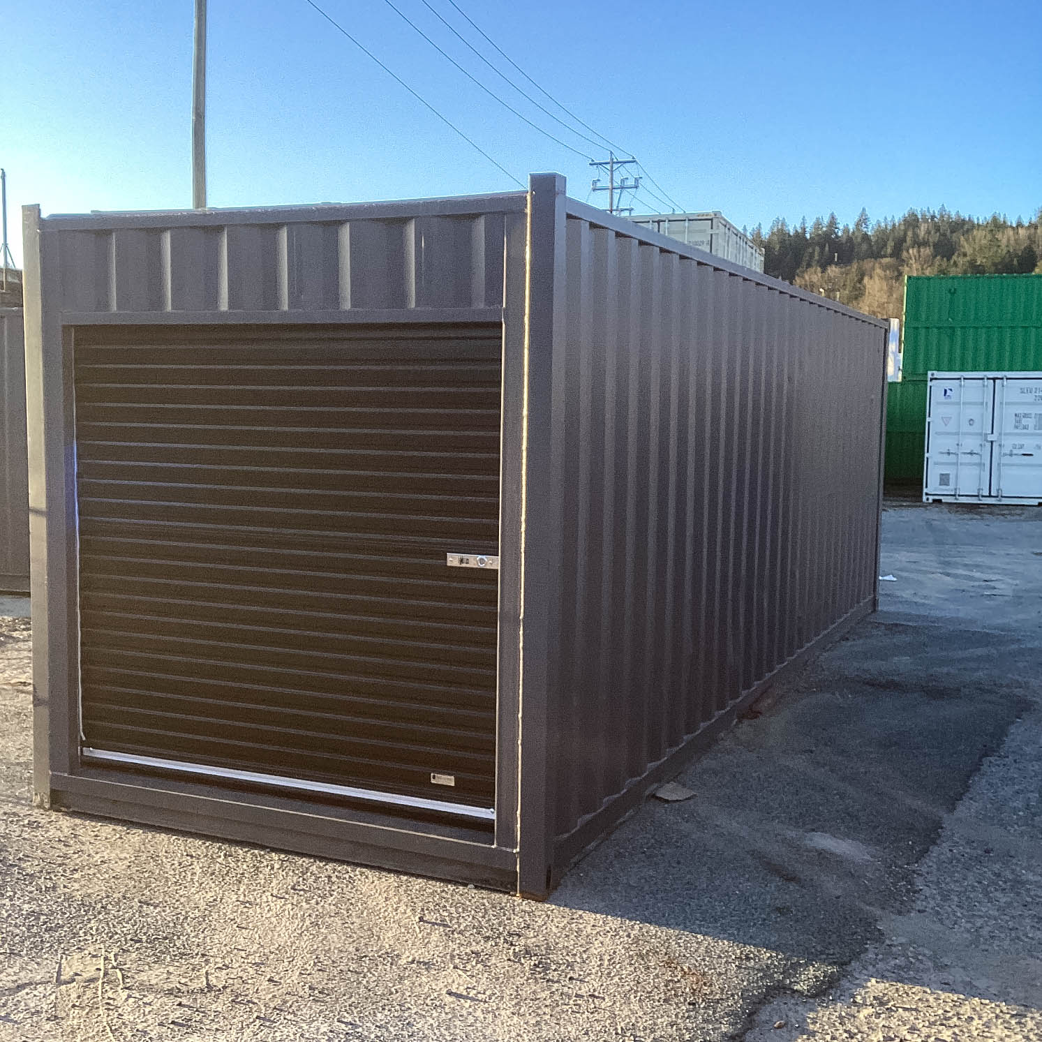 26′ Cut-Down Shipping Container w/Roll-Up Door - Custom Cubes