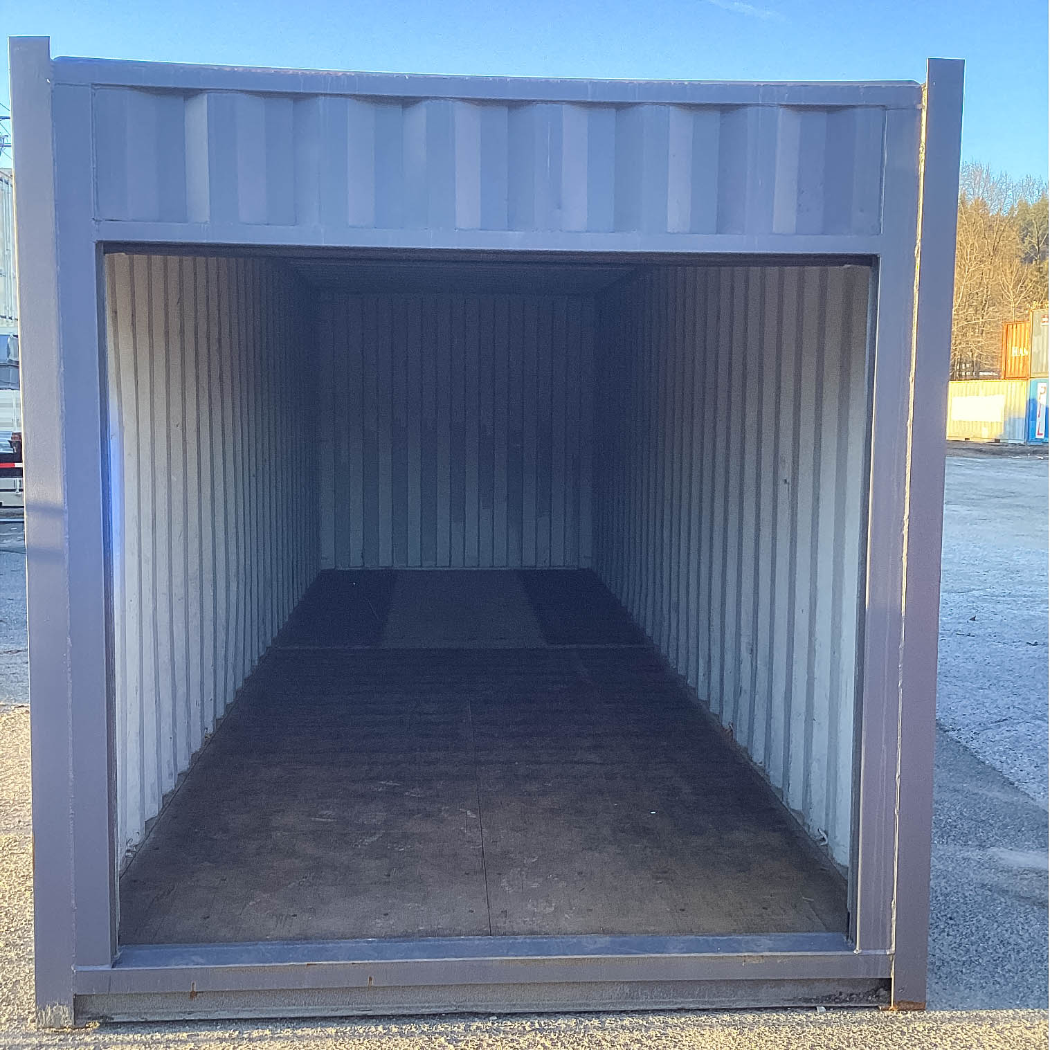 26′ Cut-Down Shipping Container w/Roll-Up Door - Custom Cubes